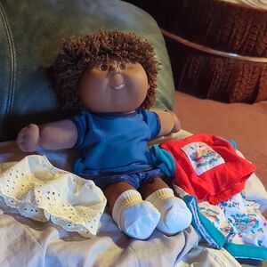 Adorable Brown Doll with Blue Outfit